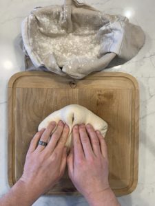 The second step of shaping an oval boule