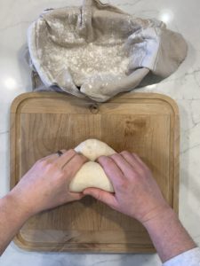 The forth step of shaping an oval boule continued 