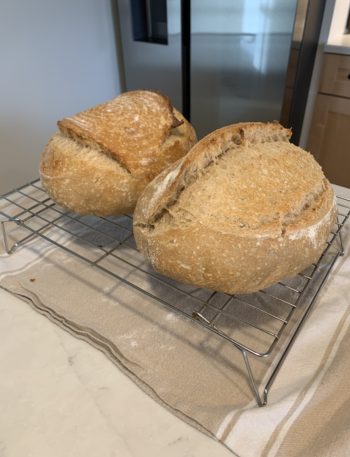 Finished sourdough cooling on a rack