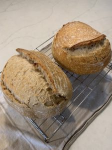 Finished sourdough cooling over a towel 